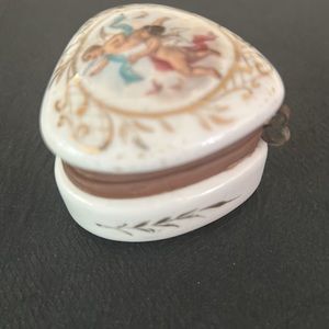 Vintage Triangle French style trinket box with cherubs.